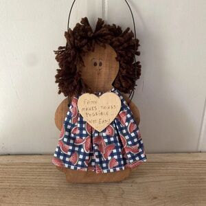 Rustic Wooden Doll with Blue and Brown Accents